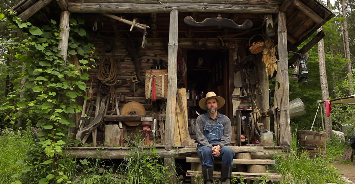Why A Man Gave Up The “American Dream” For A Hand-Built Cabin With No Power Or Running Water